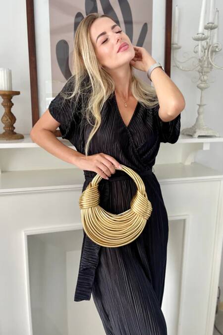 Buy Pine And Drew Gold Iris Semi Circle Shaped Leather Bag at Aza Fashions Buy_Pine And Drew_Gold Iris Semi Circle Shaped Leather Bag_at_Aza_Fashions