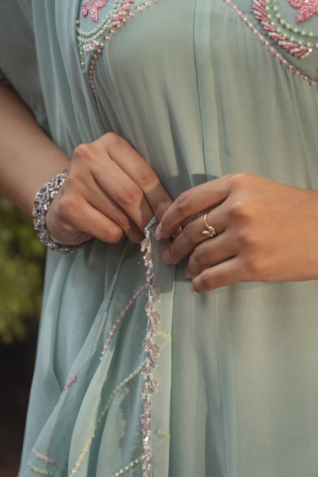 Samatvam By Anjali Bhaskar Blue Georgette, Polyester Pearls, Embroidery V-neck Tabassum Anarkali Pant Set at Aza Fashions Samatvam By Anjali Bhaskar_Blue Georgette, Polyester Pearls, Embroidery V-neck Tabassum Anarkali Pant Set _at_Aza_Fashions