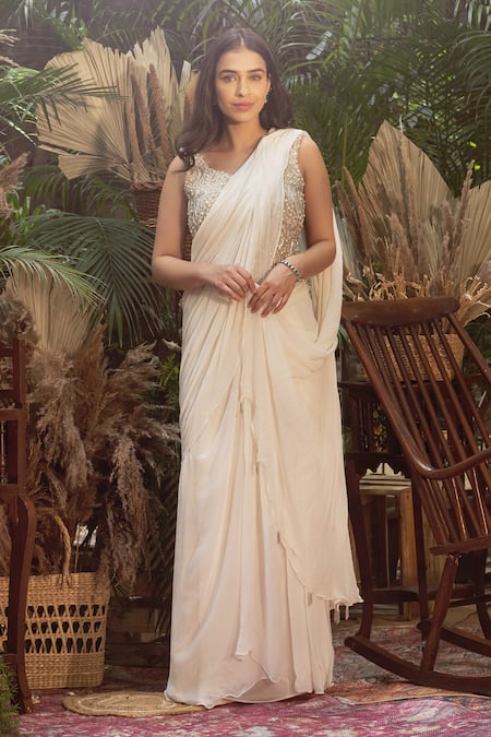 Samatvam by Anjali Bhaskar Ivory Blended Georgette Embroidered Pearl Veera Draped Saree With Corset 