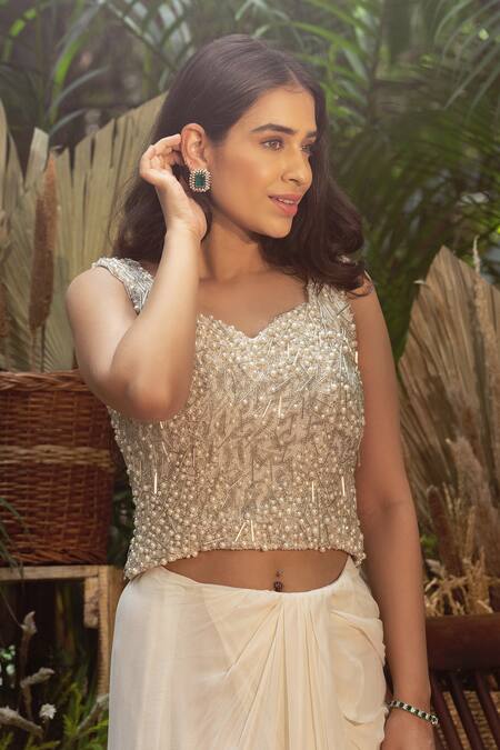 Samatvam By Anjali Bhaskar_Ivory Georgette Pearls, Beads Veera Draped Saree With Embroidered Corset _at_Aza_Fashions