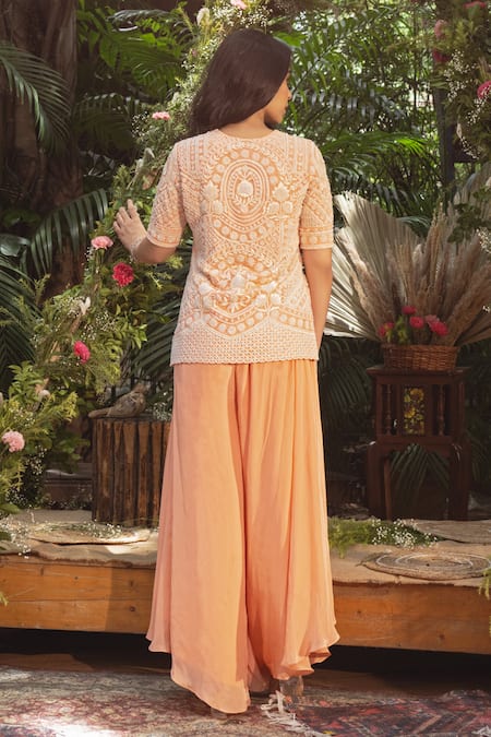 Shop Samatvam By Anjali Bhaskar Peach Crepe Pearls, Embroidery Split V-neck Zurine Jacket With Pant at Aza Fashions Shop_Samatvam By Anjali Bhaskar_Peach Crepe Pearls, Embroidery Split V-neck Zurine Jacket With Pant _at_Aza_Fashions