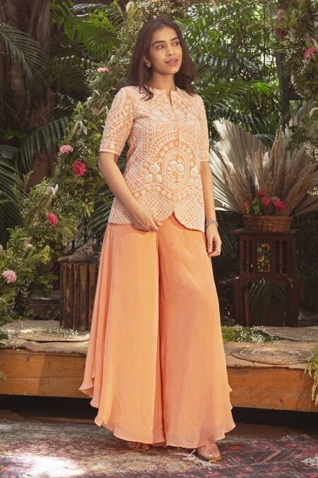 Shop Samatvam By Anjali Bhaskar Peach Crepe Pearls, Embroidery Split V-neck Zurine Jacket With Pant Online at Aza Fashions Shop_Samatvam By Anjali Bhaskar_Peach Crepe Pearls, Embroidery Split V-neck Zurine Jacket With Pant _Online_at_Aza_Fashions
