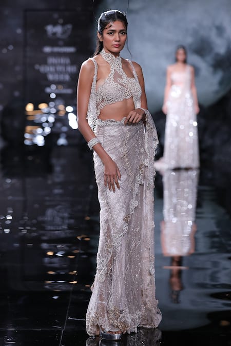 Dolly J Ivory Tulle Crystals, Pearls Hecate Embroidered Lehenga Saree Set With Cape Online at Aza Fashions Dolly J_Ivory Tulle Crystals, Pearls Hecate Embroidered Lehenga Saree Set With Cape _Online_at_Aza_Fashions