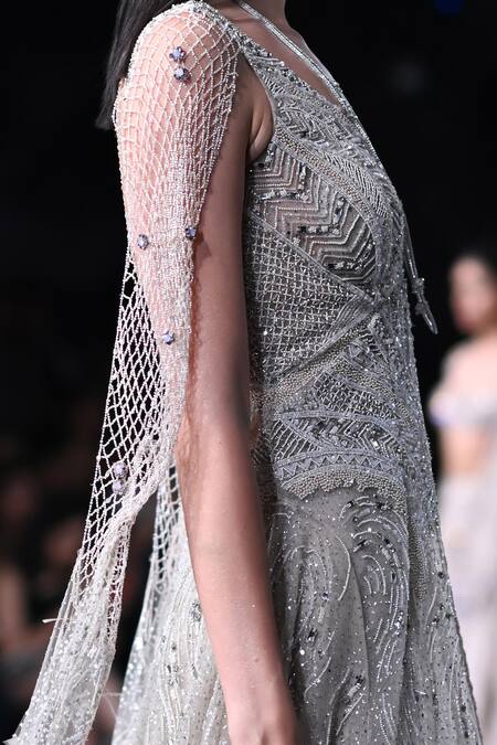 Dolly J_Ivory Tulle Sequins, Beads V-neck Embroidered Jacket And Skirt Set _at_Aza_Fashions