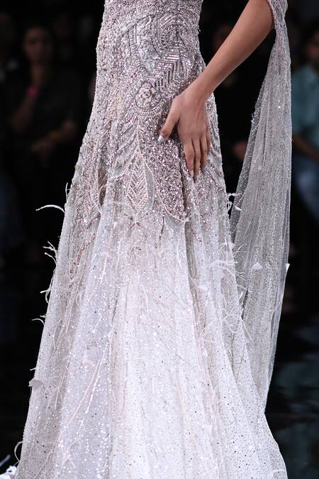 Buy_Dolly J_Ivory Tulle Sequins, Feathers One Shoulder Penelope Embroidered High Slit Gown _Online_at_Aza_Fashions