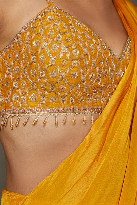 RI.Ritu Kumar Yellow Viscose Beads, Sequins Pre-draped Ruffle Saree With Embroidered Blouse at Aza Fashions RI.Ritu Kumar_Yellow Viscose Beads, Sequins Pre-draped Ruffle Saree With Embroidered Blouse _at_Aza_Fashions