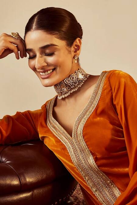 Shop Roze Orange Velvet Sequins, Lace V-neck Nargis Work Kurta With Flared Pant Online at Aza Fashions Shop_Roze_Orange Velvet Sequins, Lace V-neck Nargis Work Kurta With Flared Pant _Online_at_Aza_Fashions
