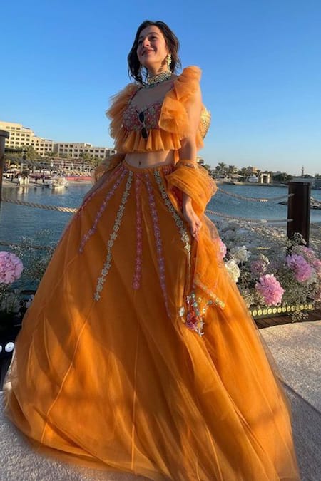 Kiran Kalsi_Orange Net Embroidery Sweetheart Neck Floral Hand Lehenga Set _at_Aza_Fashions