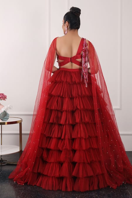 Shop Kiran Kalsi Red Net Sequins Asymmetric Ruffle Layered Lehenga Embroidered Blouse Set at Aza Fashions Shop_Kiran Kalsi_Red Net Sequins Asymmetric Ruffle Layered Lehenga Embroidered Blouse Set _at_Aza_Fashions