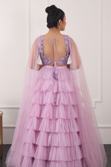 Shop Kiran Kalsi Purple Net Embroidery Asymmetric Ruffle Layered Lehenga Floral Blouse Set at Aza Fashions Shop_Kiran Kalsi_Purple Net Embroidery Asymmetric Ruffle Layered Lehenga Floral Blouse Set _at_Aza_Fashions