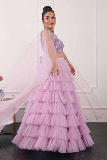 Shop Kiran Kalsi Purple Net Embroidery Asymmetric Ruffle Layered Lehenga Floral Blouse Set Online at Aza Fashions Shop_Kiran Kalsi_Purple Net Embroidery Asymmetric Ruffle Layered Lehenga Floral Blouse Set _Online_at_Aza_Fashions