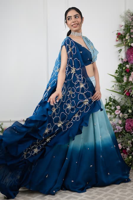Kiran Kalsi Blue Crepe, Organza Embroidery, Sequins V-neck Ombre Lehenga And Floral Cape Set at Aza Fashions Kiran Kalsi_Blue Crepe, Organza Embroidery, Sequins V-neck Ombre Lehenga And Floral Cape Set _at_Aza_Fashions