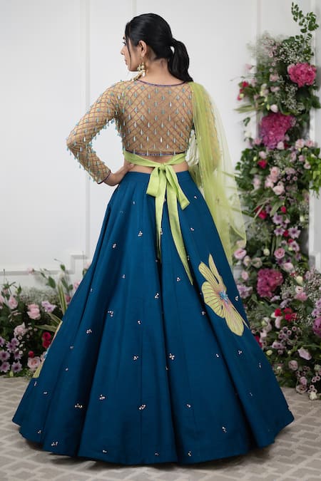 Shop Kiran Kalsi Green Net, Silk Crystals, Embroidery V-neck Raw Floral Applique Lehenga Set at Aza Fashions Shop_Kiran Kalsi_Green Net, Silk Crystals, Embroidery V-neck Raw Floral Applique Lehenga Set _at_Aza_Fashions