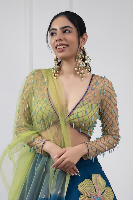 Kiran Kalsi Green Net, Silk Crystals, Embroidery V-neck Raw Floral Applique Lehenga Set Online at Aza Fashions Kiran Kalsi_Green Net, Silk Crystals, Embroidery V-neck Raw Floral Applique Lehenga Set _Online_at_Aza_Fashions