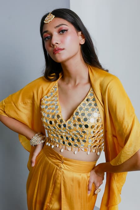 Buy Ria Shah Label Yellow Modal, Cotton Mirrors, Beads V-neck Ruffled Tassel Detail Cape Blouse Set Online at Aza Fashions Buy_Ria Shah Label_Yellow Modal, Cotton Mirrors, Beads V-neck Ruffled Tassel Detail Cape Blouse Set _Online_at_Aza_Fashions