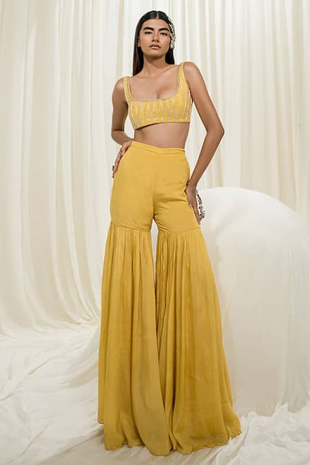 Shop EASE Yellow Crepe, Viscose, Organza Pearls Round Neck Embroidered Bustier Gharara Set Online at Aza Fashions Shop_EASE_Yellow Crepe, Viscose, Organza Pearls Round Neck Embroidered Bustier Gharara Set _Online_at_Aza_Fashions