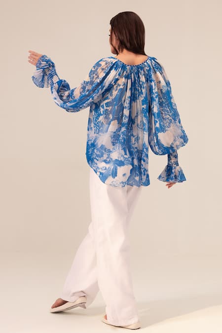 Shop Reena Sharma Blue Chiffon Tassels V-neck Azure Floral Print Top at Aza Fashions Shop_Reena Sharma_Blue Chiffon Tassels V-neck Azure Floral Print Top _at_Aza_Fashions