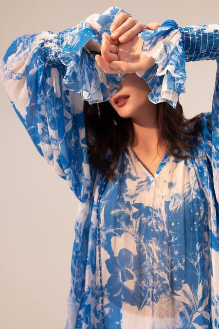 Reena Sharma Blue Chiffon Tassels V-neck Azure Floral Print Top Online at Aza Fashions Reena Sharma_Blue Chiffon Tassels V-neck Azure Floral Print Top _Online_at_Aza_Fashions