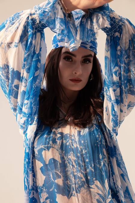 Shop Reena Sharma Blue Chiffon Tassels V-neck Azure Floral Print Top Online at Aza Fashions Shop_Reena Sharma_Blue Chiffon Tassels V-neck Azure Floral Print Top _Online_at_Aza_Fashions