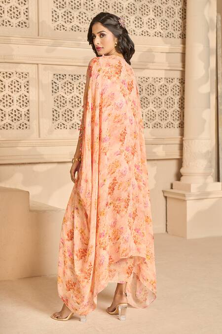 Shop Aariyana Couture Peach Georgette Beads Scoop Neck Floral Print Draped Dress And Cape Set at Aza Fashions Shop_Aariyana Couture_Peach Georgette Beads Scoop Neck Floral Print Draped Dress And Cape Set_at_Aza_Fashions