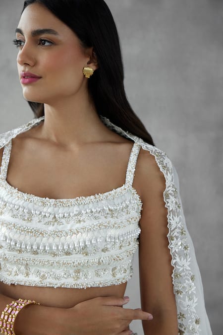 Mukta Sabharwal_Ivory Silk, Organza, Tulle Petunia Bloom Patch Embellished Bridal Lehenga Set _Online_at_Aza_Fashions