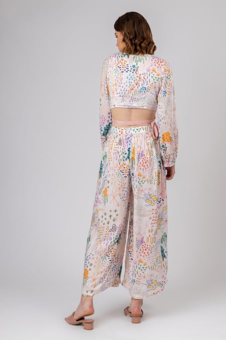 Shop Doodlage Multi Color Modal, Rayon V-neck Wonderland Print Wrap Top With Flared Pant at Aza Fashions Shop_Doodlage_Multi Color Modal, Rayon V-neck Wonderland Print Wrap Top With Flared Pant _at_Aza_Fashions
