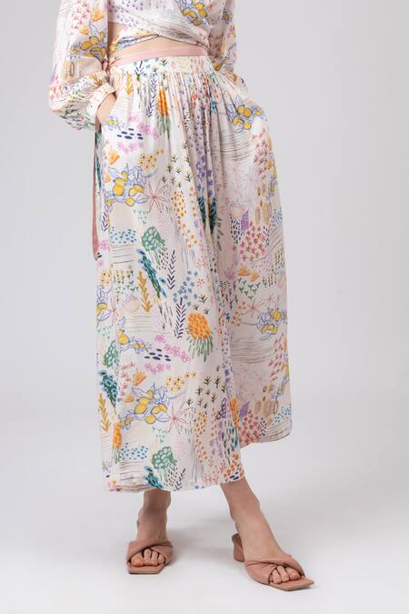 Buy Doodlage Multi Color Modal, Rayon V-neck Wonderland Print Wrap Top With Flared Pant Online at Aza Fashions Buy_Doodlage_Multi Color Modal, Rayon V-neck Wonderland Print Wrap Top With Flared Pant _Online_at_Aza_Fashions