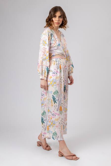 Doodlage Multi Color Modal, Rayon V-neck Wonderland Print Wrap Top With Flared Pant at Aza Fashions Doodlage_Multi Color Modal, Rayon V-neck Wonderland Print Wrap Top With Flared Pant _at_Aza_Fashions