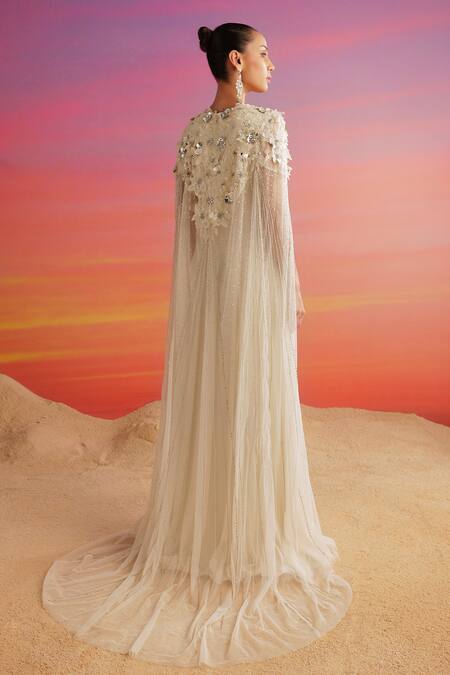 Shop Not So Serious By Pallavi Mohan Ivory Georgette Embellished 3d Tulip Round Valeria Cape With Gown at Aza Fashions Shop_Not So Serious By Pallavi Mohan_Ivory Georgette Embellished 3d Tulip Round Valeria Cape With Gown _at_Aza_Fashions