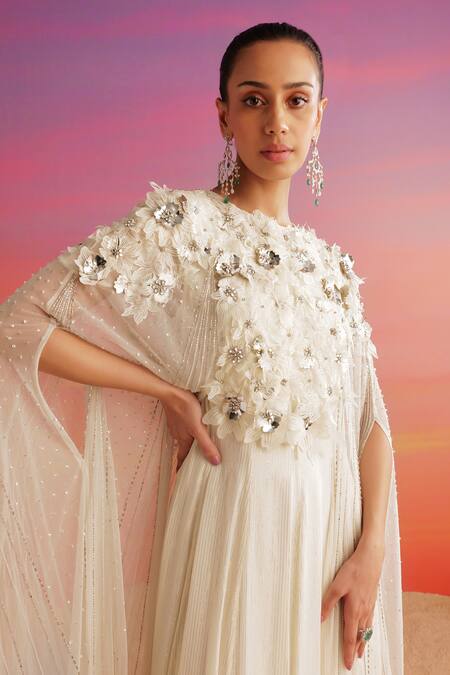 Not So Serious By Pallavi Mohan Ivory Georgette Embellished 3d Tulip Round Valeria Cape With Gown Online at Aza Fashions Not So Serious By Pallavi Mohan_Ivory Georgette Embellished 3d Tulip Round Valeria Cape With Gown _Online_at_Aza_Fashions