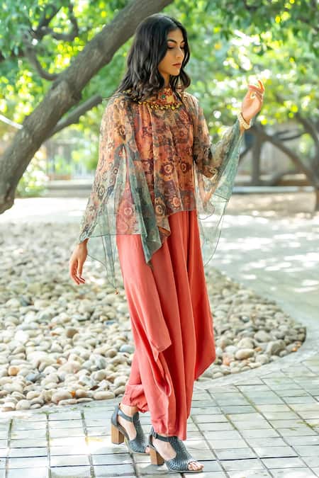 Nikita Vishakha_Orange Organza, Net Embroidery V-neck Draped Jumpsuit With Floral Pattern Cape _Online_at_Aza_Fashions