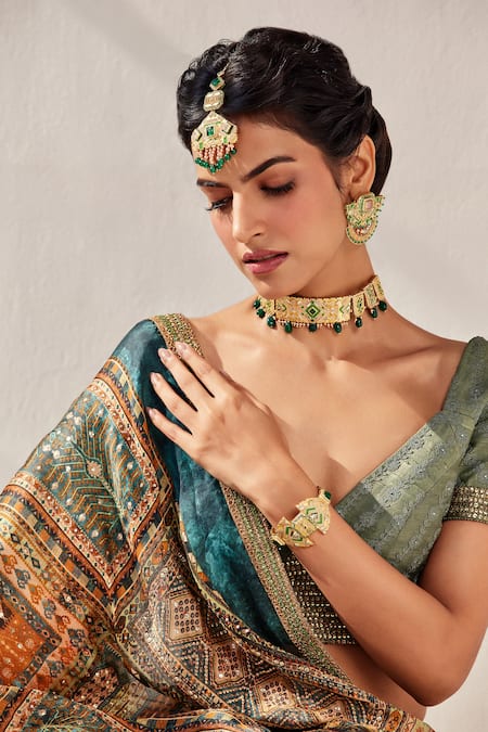 Shop Aulerth X JJ Valaya Green Crystals, Diamonds Rumeli Embellished Cuff at Aza Fashions Shop_Aulerth X JJ Valaya_Green Crystals, Diamonds Rumeli Embellished Cuff _at_Aza_Fashions