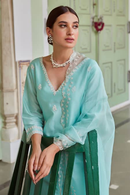 Charu Makkar Blue Chanderi Silk Embroidery, Cut Work Floral Asymmetric Suit Palazzo Set at Aza Fashions Charu Makkar_Blue Chanderi Silk Embroidery, Cut Work Floral Asymmetric Suit Palazzo Set _at_Aza_Fashions