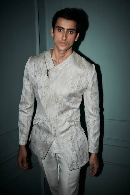 Shop Jigar & Nikita White Jersey, Rayon Embroidery Leaf Textured Jacket And Pant Set at Aza Fashions Shop_Jigar & Nikita_White Jersey, Rayon Embroidery Leaf Textured Jacket And Pant Set_at_Aza_Fashions