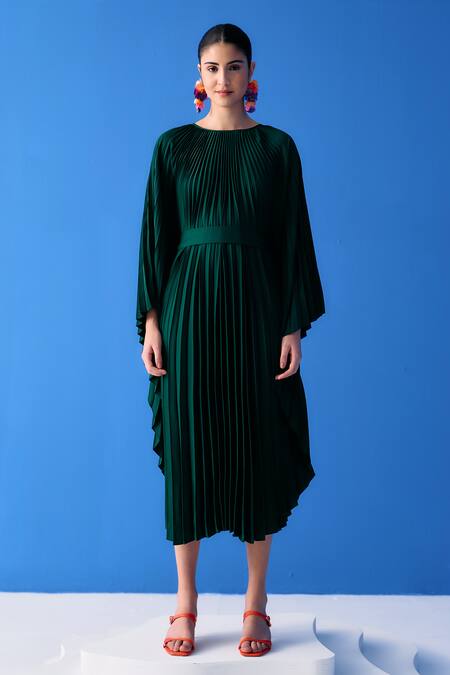 Buy Pleats By Aruni Green Crepe Round Pleated Cape Dress at Aza Fashions Buy_Pleats By Aruni_Green Crepe Round Pleated Cape Dress_at_Aza_Fashions