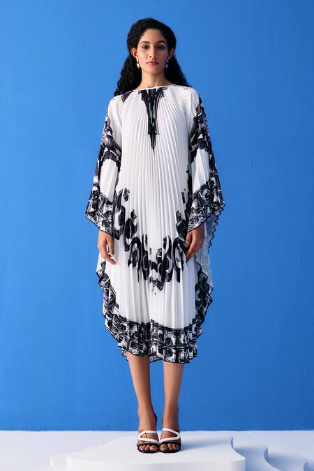 Pleats By Aruni_Black Crepe Boat Neck Abstract Bloom Print Pleated Dress_Online_at_Aza_Fashions
