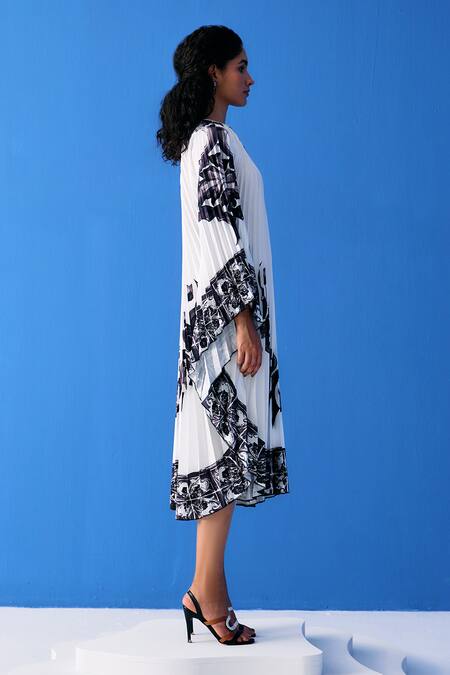 Shop_Pleats By Aruni_Black Crepe Boat Neck Abstract Bloom Print Pleated Dress_Online_at_Aza_Fashions