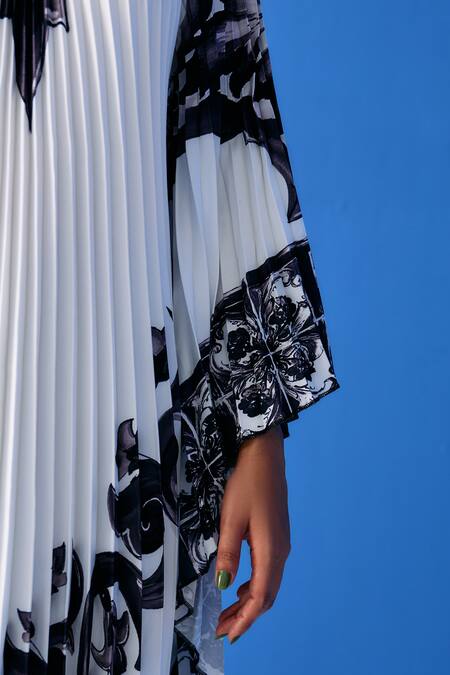 Pleats By Aruni_Black Crepe Boat Neck Abstract Bloom Print Pleated Dress_at_Aza_Fashions