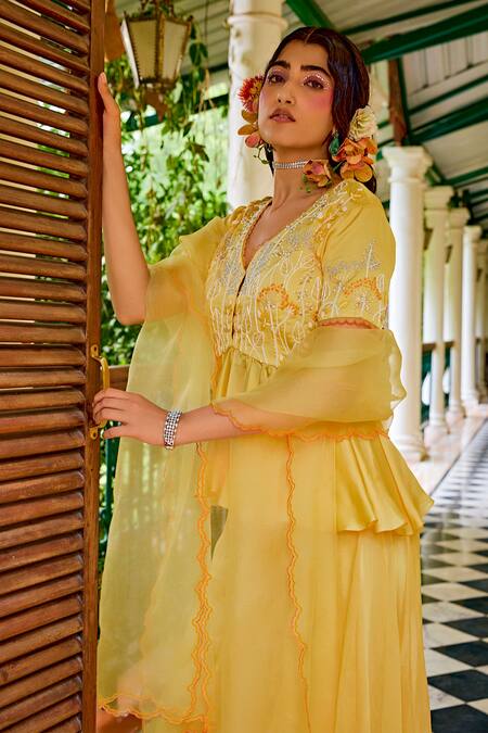 1999ad By Amita & Deepak Yellow Organza Cut Work, Embroidery, Zari V-neck Peplum Top Sharara Set Online at Aza Fashions 1999ad By Amita & Deepak_Yellow Organza Cut Work, Embroidery, Zari V-neck Peplum Top Sharara Set _Online_at_Aza_Fashions