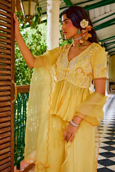 1999ad By Amita & Deepak Yellow Organza Cut Work, Embroidery, Zari V-neck Peplum Top Sharara Set at Aza Fashions 1999ad By Amita & Deepak_Yellow Organza Cut Work, Embroidery, Zari V-neck Peplum Top Sharara Set _at_Aza_Fashions