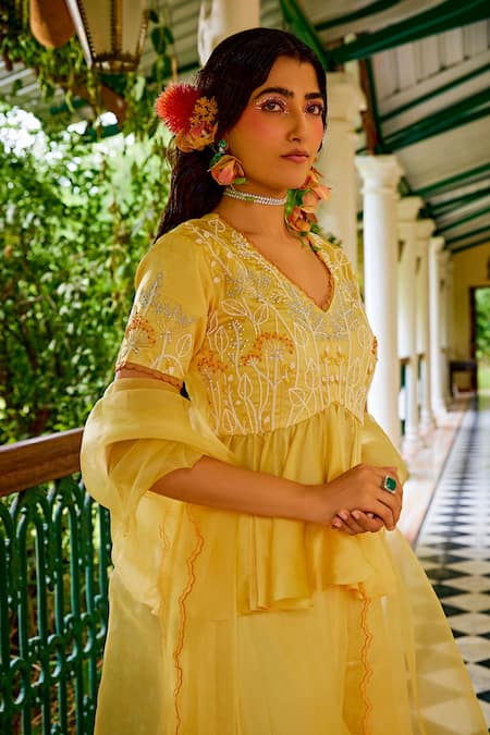Buy 1999ad By Amita & Deepak Yellow Organza Cut Work, Embroidery, Zari V-neck Peplum Top Sharara Set Buy_1999ad By Amita & Deepak_Yellow Organza Cut Work, Embroidery, Zari V-neck Peplum Top Sharara Set