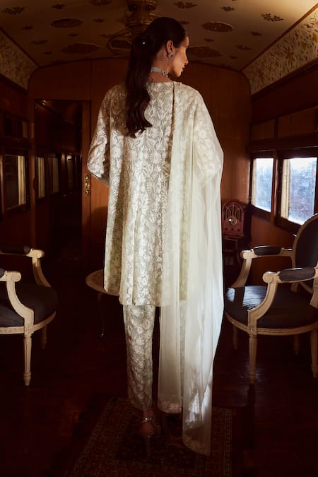 Shop Rococo Green Net Sequins, Cut Work, Embroidery Zenith Thread Short Anarkali Pant Set at Aza Fashions Shop_Rococo_Green Net Sequins, Cut Work, Embroidery Zenith Thread Short Anarkali Pant Set _at_Aza_Fashions