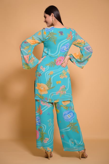 Shop Seams Pret And Couture Blue Georgette Printed Floral Round Nimrit Kurta And Pant Set at Aza Fashions Shop_Seams Pret And Couture_Blue Georgette Printed Floral Round Nimrit Kurta And Pant Set _at_Aza_Fashions