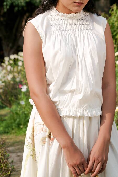 Ahmev Ivory Cotton Tassels Round Neck Pintuck Placement Top Online at Aza Fashions Ahmev_Ivory Cotton Tassels Round Neck Pintuck Placement Top _Online_at_Aza_Fashions