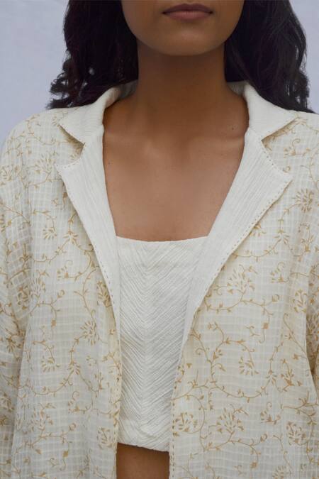 Ahmev Ivory Cotton Embroidery Collared Reversible Bloom Print Jacket at Aza Fashions Ahmev_Ivory Cotton Embroidery Collared Reversible Bloom Print Jacket _at_Aza_Fashions