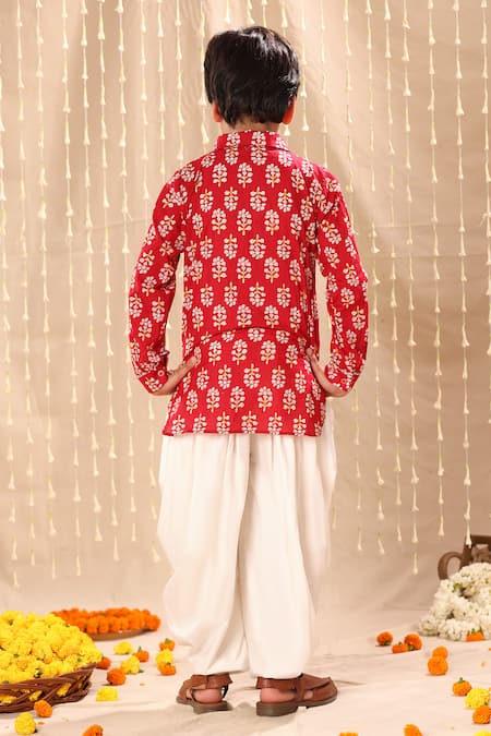 Shop Littlecheer Red Cotton Flower Print Short Kurta With Dhoti Salwar at Aza Fashions Shop_Littlecheer_Red Cotton Flower Print Short Kurta With Dhoti Salwar _at_Aza_Fashions