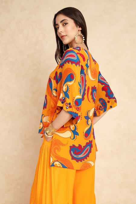 Shop Style Junkiie Yellow Crepe V-neck Paisley Pattern Short Tunic at Aza Fashions Shop_Style Junkiie_Yellow Crepe V-neck Paisley Pattern Short Tunic _at_Aza_Fashions