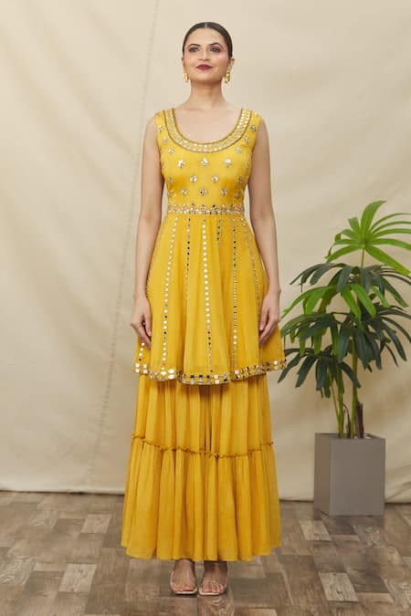 Samyukta Singhania_Yellow Crepe, Net Embroidery, Mirrors, Cut Work Round Peplum Kurta Gharara Set _Online_at_Aza_Fashions