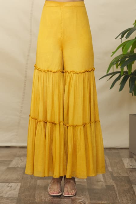 Samyukta Singhania_Yellow Crepe, Net Embroidery, Mirrors, Cut Work Round Peplum Kurta Gharara Set _at_Aza_Fashions