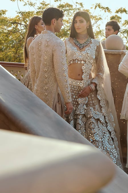 Abhinav Mishra Beige Net Embroidered Mirror Cutwork V Floral Bridal Lehenga Set Online at Aza Fashions Abhinav Mishra_Beige Net Embroidered Mirror Cutwork V Floral Bridal Lehenga Set _Online_at_Aza_Fashions